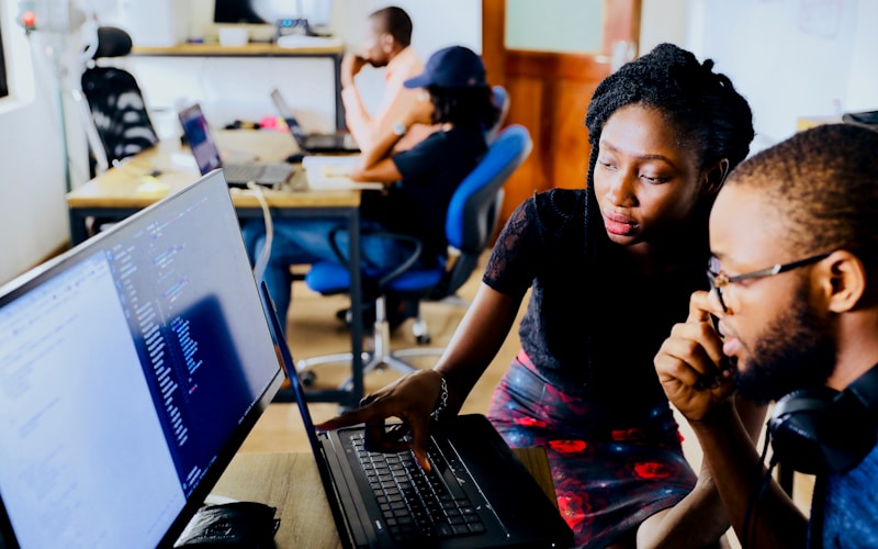 Small business owner working with managed IT support technician